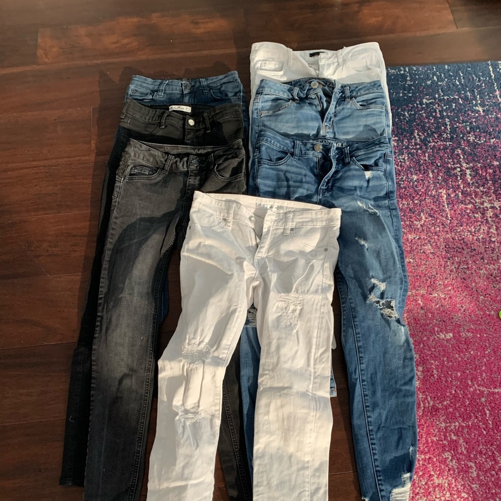 7 pairs of girls jeans sizes 12/14 and 22-25